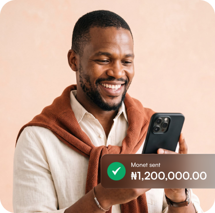 Business owner receiving a successful payout on his phone